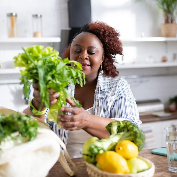woman cooking with fresh ingredients